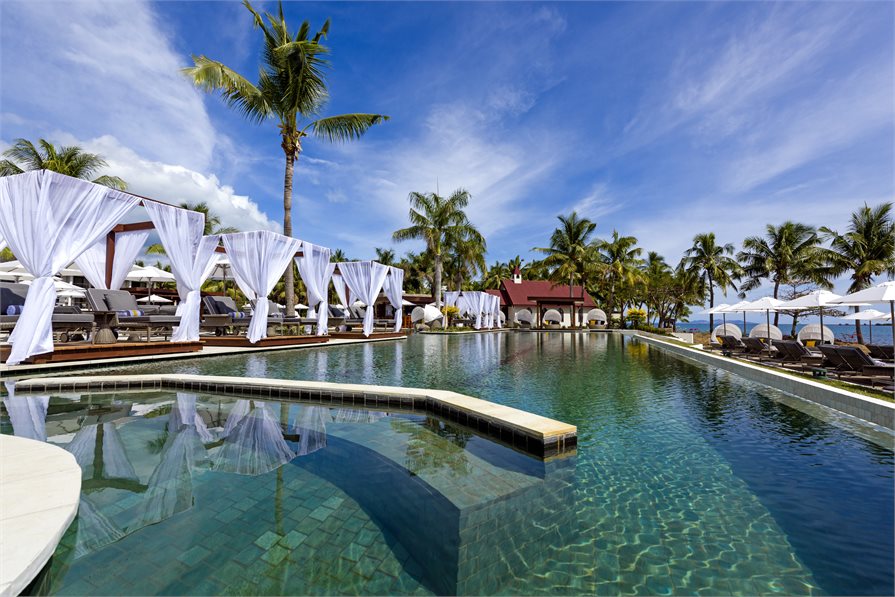 Pool side loungers at Waitui Beach Club