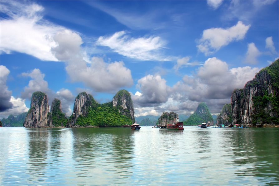 Ha Long Bay boats and mountains