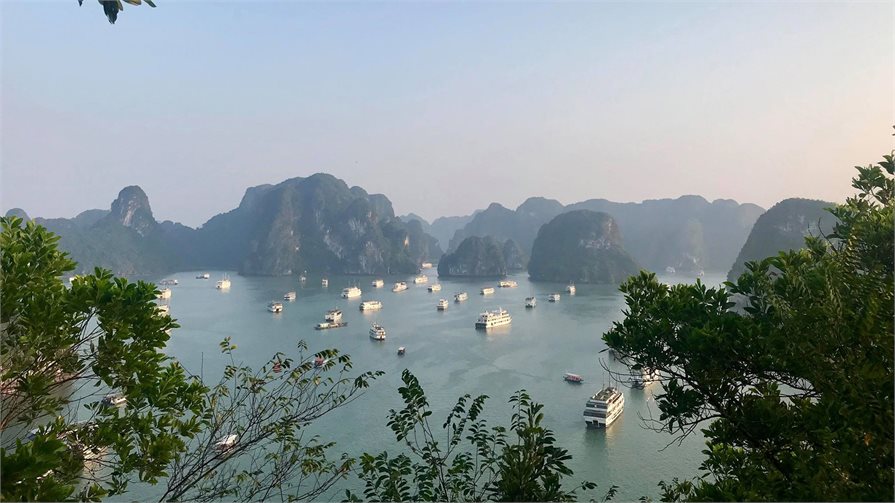 boat and mountains view ha long bay vietnam