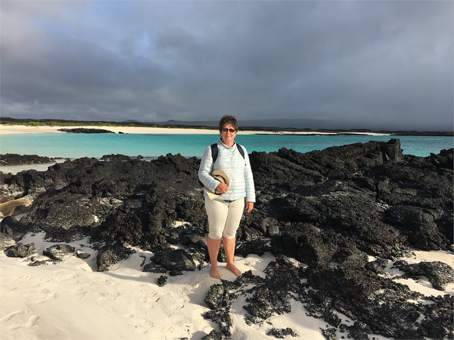Carolyn Hedley standing on the beach Galapagos Islands