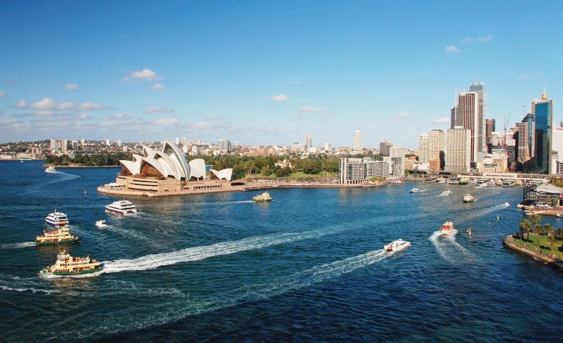 View of Sydney Opera house and harbor with boats