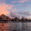 Fly & Cruise Azure Atolls to Auckland