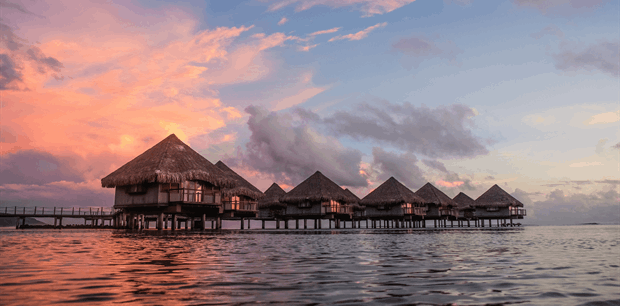 Fly & Cruise Azure Atolls to Auckland